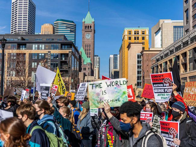 Demonstrators march as they protest outside the Hennepin County Government Center before jury selection at the trial of former Minneapolis Police officer Derek Chauvin. Picture: AFP