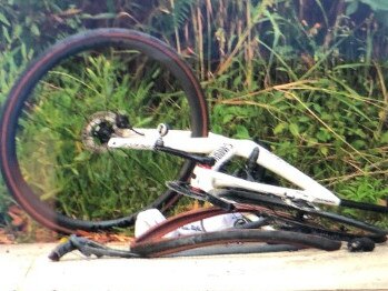 A damaged bike at the scene of the crash. Picture: Jim O'Rourke