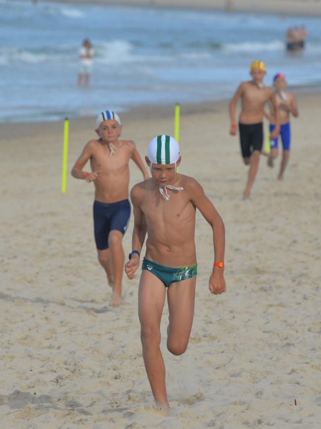 Running action at the Queensland Youth Surf Life Saving Championships on February 17.