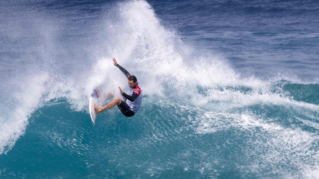 CORRECTION / US surfer Crosby Colapinto rides a wave during the World Surf League's (WSL) Lexus Pipe Pro surf competition at Banzai Pipeline off the north shore of Oahu, Hawaii, on February 6, 2024. Colapinto was eliminated by Imaikalani deVault (HAW) in the round of 16. (Photo by Brian Bielmann / AFP) / RESTRICTED TO EDITORIAL USE / â&#128;&#156;The erroneous mention[s] appearing in the metadata of this photo by Brian Bielmann has been modified in AFP systems in the following manner: [rides a wave] instead of [makes it through his heat to move on to the quarter-finals ]. Please immediately remove the erroneous mention[s] from all your online services and delete it (them) from your servers. If you have been authorised by AFP to distribute it (them) to third parties, please ensure that the same actions are carried out by them. Failure to promptly comply with these instructions will entail liability on your part for any continued or post notification usage. Therefore we thank you very much for all your attention and prompt action. We are sorry for the inconvenience this notification may cause and remain at your disposal for any further information you may require.â&#128;&#157;