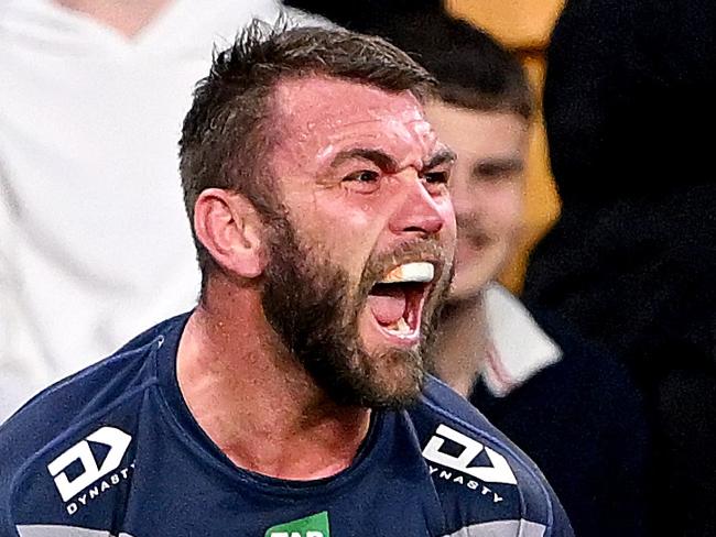 BRISBANE, AUSTRALIA - AUGUST 25: Kyle Feldt of the Cowboys celebrates after scoring a try during the round 26 NRL match between Dolphins and North Queensland Cowboys at Suncorp Stadium on August 25, 2023 in Brisbane, Australia. (Photo by Bradley Kanaris/Getty Images)