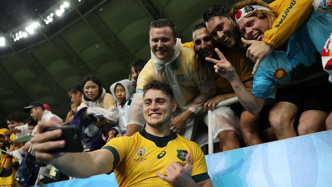 FUKUROI, JAPAN - OCTOBER 11: James O'Connor of Australia takes a picture with fans following his side's victory during the Rugby World Cup 2019 Group D match between Australia and Georgia at Shizuoka Stadium Ecopa on October 11, 2019 in Fukuroi, Shizuoka, Japan. (Photo by Dan Mullan/Getty Images)