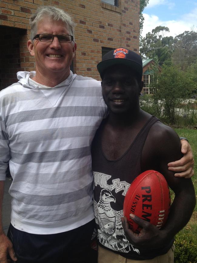 Merv Keane with Essendon AFL player, Tiwi Islands recruit Anthony McDonald-Tipungwuti.