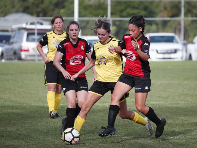 Tigers' Jemma Morrison and Lions' Aleeah Davern. PICTURE: BRENDAN RADKE