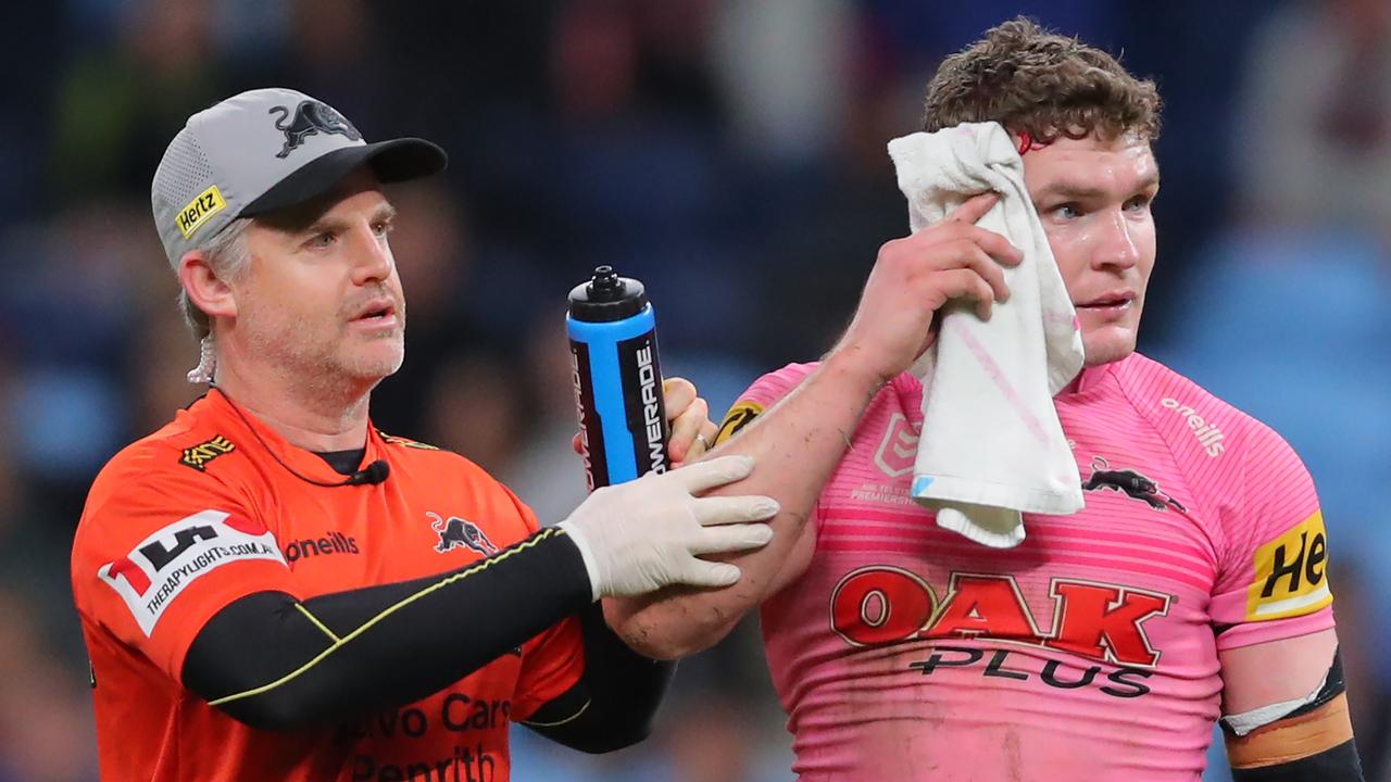 SYDNEY, AUSTRALIA – JUNE 10: Liam Martin of the Roosters walks off for HIA and receives medical attention during the round 15 NRL match between Sydney Roosters and Penrith Panthers at Allianz Stadium on June 10, 2023 in Sydney, Australia. (Photo by Jeremy Ng/Getty Images)