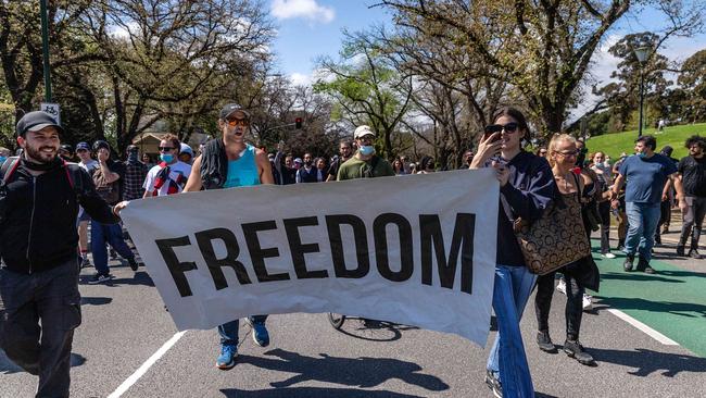 Protesters march at an anti-vax, anti-lockdown protest in Melbourne on October 2. Picture: NCA NewsWire/Sarah Matray