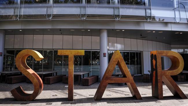 A sign stands outside The Star casino and event centre in Sydney on September 2, 2024. Troubled resort and casino operator Star Entertainment was temporarily delisted from the Australian Securities Exchange on September 2 after failing to post its annual financial results. (Photo by DAVID GRAY / AFP)