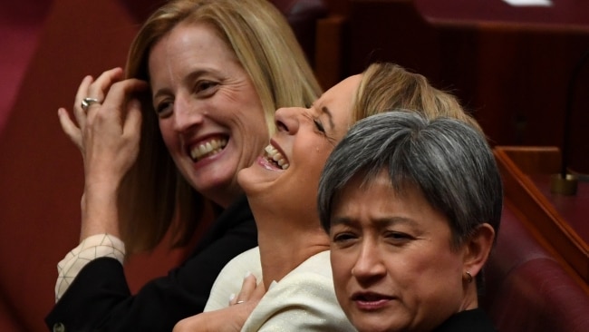 Senator Katy Gallagher (left) Senator Kristina Keneally and Senator Penny Wong (right) sitting together in the Senate in 2019.
