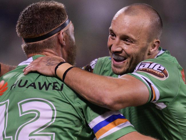 Elliot Whitehead of the Raiders and Josh Hodgson of the Raiders celebrate a try during the Round 5 NRL match between the Canberra Raiders and the Parramatta Eels at GIO Stadium in Canberra, Sunday, April 14, 2019. (AAP Image/Rohan Thomson) NO ARCHIVING, EDITORIAL USE ONLY