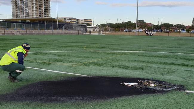 A man inspects the damage to Heffron Park. Picture: Peter Hennessy