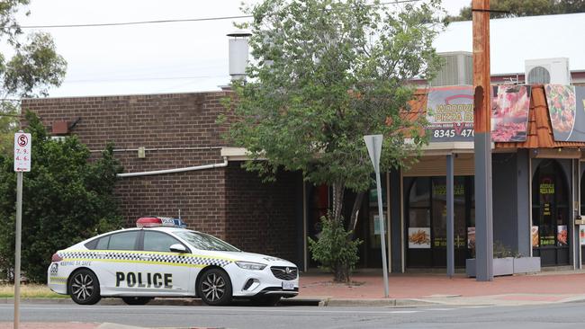 Police still monitoring the Woodville Pizza Bar on Monday morning. Picture: Tait Schmaal