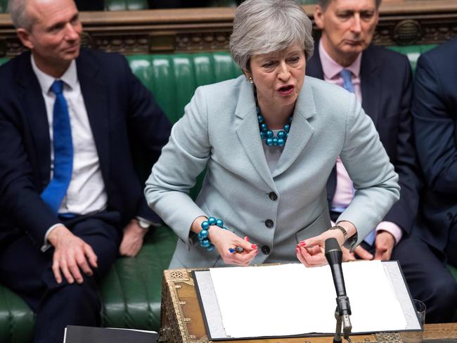 A handout photograph released by the UK Parliament shows Britain's Prime Minister Theresa May making a statement in the House of Commons in London on March 25, 2019 outlining the next steps that parliament will take in the Brexit process. - Prime Minister Theresa May admitted Monday she had still not secured the votes needed to get her Brexit deal through parliament, raising again the prospect that Britain could crash out of the European Union in two weeks' time. (Photo by Jessica TAYLOR / UK PARLIAMENT / AFP) / RESTRICTED TO EDITORIAL USE - NO USE FOR ENTERTAINMENT, SATIRICAL, ADVERTISING PURPOSES - MANDATORY CREDIT " AFP PHOTO /JESSICA TAYLOR / UK Parliament"