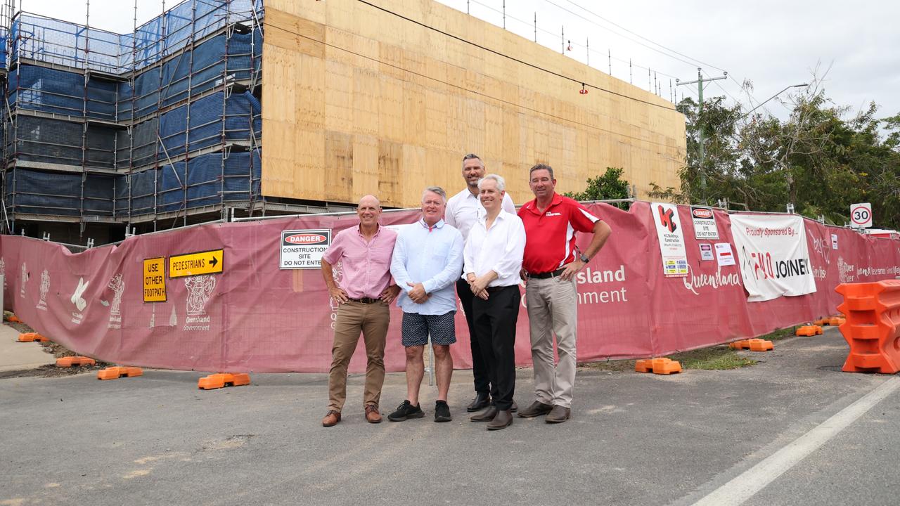 Labor Mulgrave candidate Richie Bates, Cairns MP Michael Healy, Labor Leichhardt candidate Matt Smith, federal skills and training minister Andrew Giles and Barron River MP Craig Crawford announce an additional 4100 fee-free TAFE placements for construction courses while visiting an 18 social home construction site in Cairns.