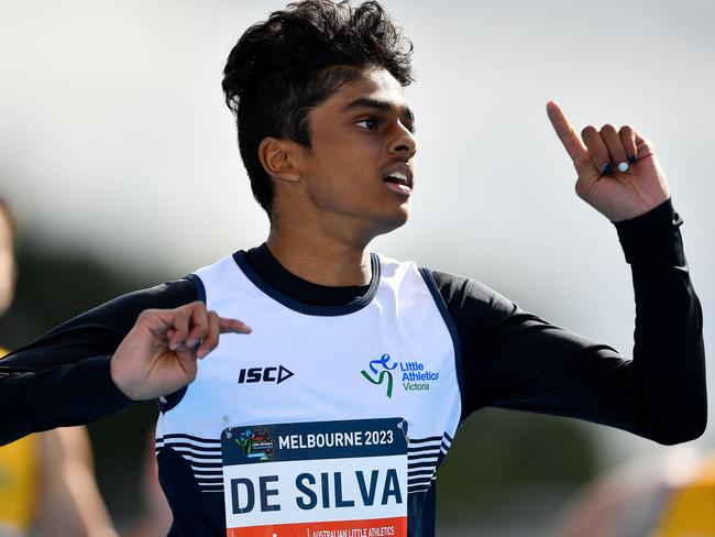 Kevin De Silva (VIC) celebrates after winning the Boys U13 100m during the Australian Little Athletics Championships at Lakeside Stadium in Albert Park, Victoria on April 23, 2023.