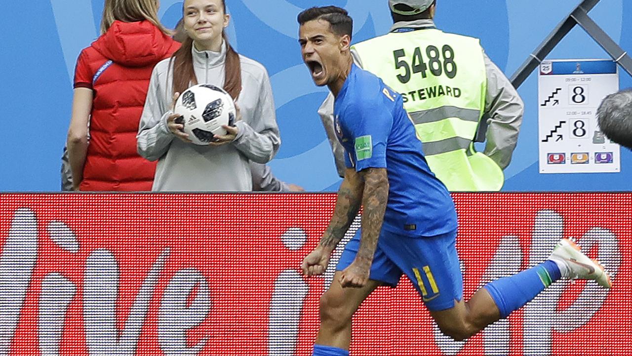 World Cup 2018: Topless Brazil fans in Rio celebrate dramatic late win over  Costa Rica after goals from Philippe Coutinho and Neymar