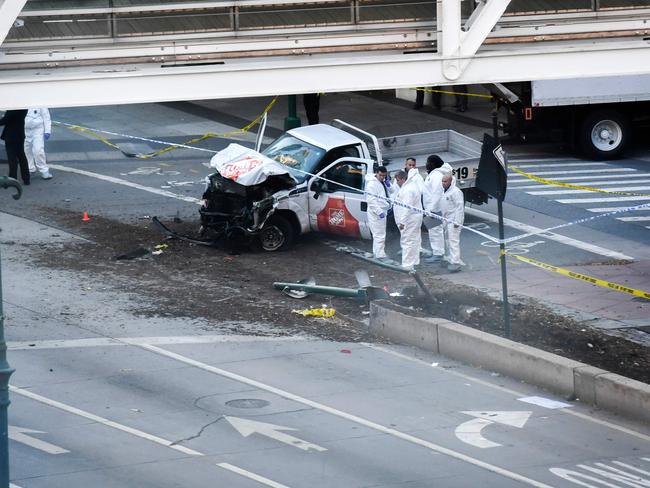 Investigators inspect a truck following a shooting incident in New York. Picture: AFP