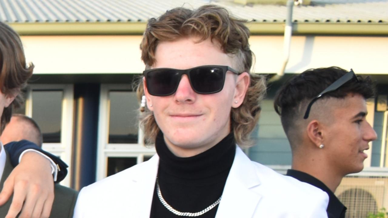 We’re definitely getting some Miami Vice vibes from this 80s style mullet at the Mountain Creek State High formal. Definitely a ringer for Don Johnson’s character Detective James Crockett. Picture: Eddie Franklin