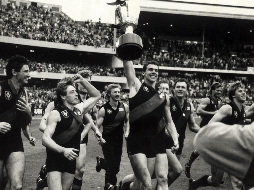 Salmon with premiership cup during a victory lap after the 1985 Grand Final.