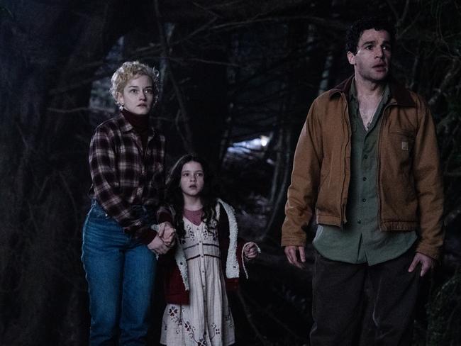 (from left) Charlotte (Julia Garner), Ginger (Matilda Firth) and Blake (Christopher Abbott) in Wolf Man, directed by Leigh Whannell.