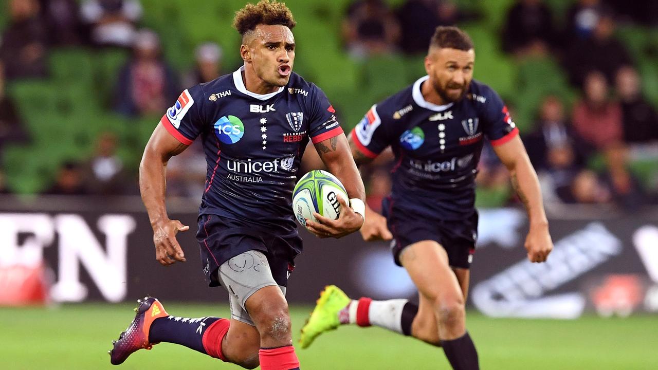 Rebels player Will Genia supported by teammate Quade Cooper.