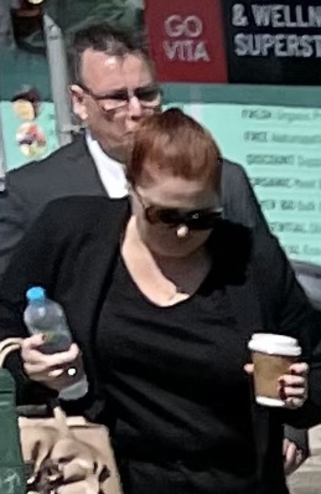 Graeme John Woods, supported by his wife, during a break in the hearing held at Taree Local Court.