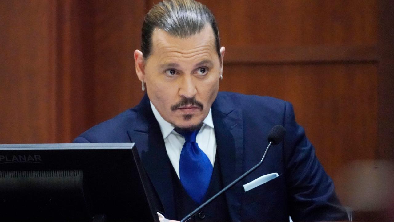 Amber Heard’s legal team is reportedly considering putting Johnny Depp back on the stand along with actress Ellen Barkin. Picture: Steve Helber/AFP