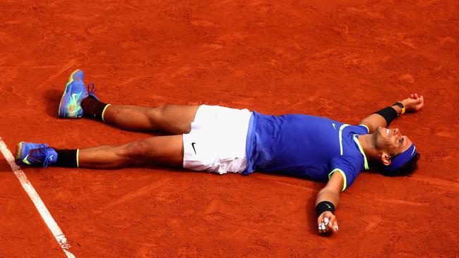 Rafael Nadal of Spain celebrates victory following the mens singles final against Stan Wawrinka.