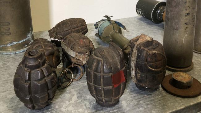 Hand grenades seized during Thursday’s operation. Picture: Madeline Crittenden.