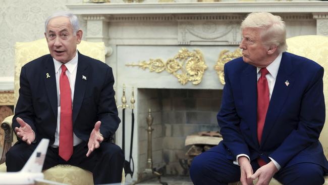 US President Donald Trump, right, listens as Israel's Prime Minister Benjamin Netanyahu speaks during a meeting in the Oval Office at the White House in April. Picture: AP