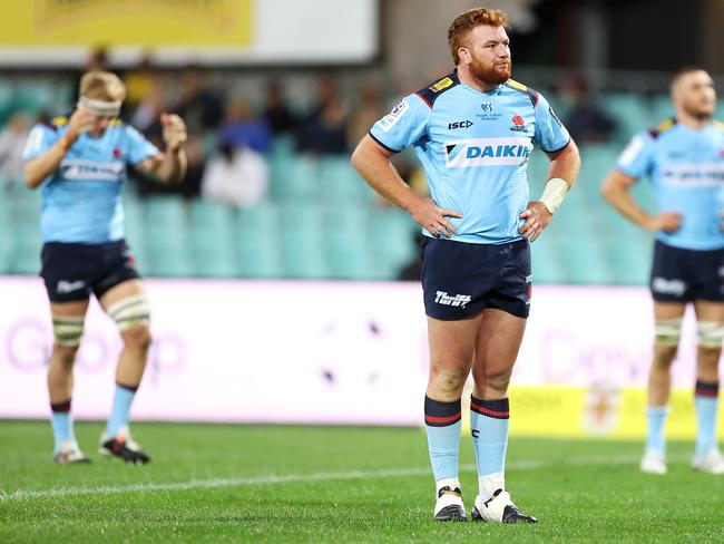 SYDNEY, AUSTRALIA - MAY 14: Harry Johnson-Holmes of the Waratahs looks dejected after a try during the round one Super Rugby Trans-Tasman match between the NSW Waratahs and the Hurricanes at Sydney Cricket Ground on May 14, 2021 in Sydney, Australia. (Photo by Mark Kolbe/Getty Images)