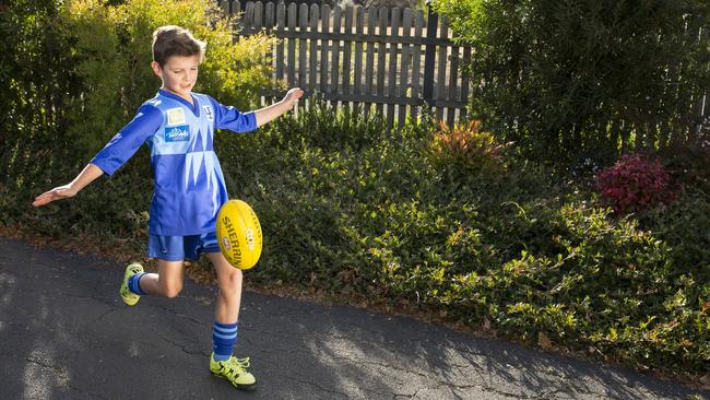 Oscar Wiggins, 8, is just one of tens of thousands of Tassie kids who could benefit from investment in sport. Picture: EDDIE SAFARIK