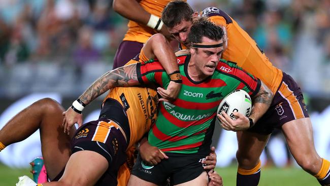 SYDNEY, AUSTRALIA - MAY 02: Ethan Lowe of the Rabbitohs is tackled during the round eight NRL match between the South Sydney Rabbitohs and the Brisbane Broncos at ANZ Stadium on May 02, 2019 in Sydney, Australia. (Photo by Cameron Spencer/Getty Images)