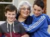 Fran Gronow was caring for her two grandkids at home in Elwood when she began to exhibit signs of a stroke. her elder grandson Eoin, aged 12, saved her life, recognising the signs and calling the ambulance. Pictured is Eoin (12) (R) , Fran and Mark (10) (L) who also played a role in the saving of his Gran. Picture: Paul Loughnan