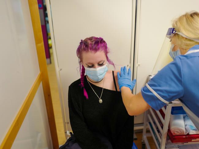 Erin Lilly becomes the first person in Cornwall to receive their COVID-19 vaccination. Picture: Getty Images