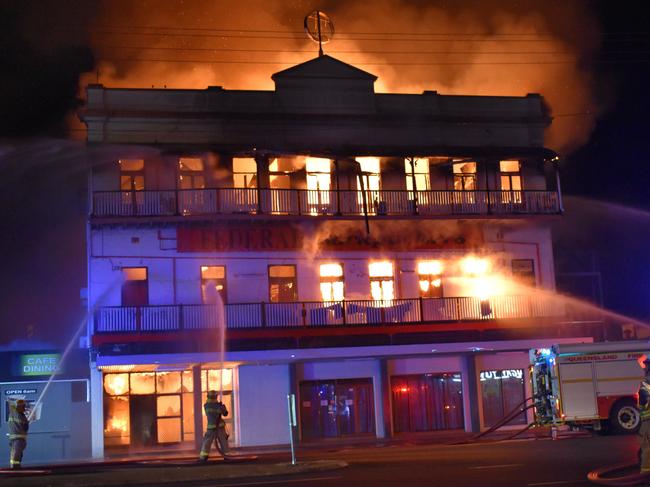 Crews battle the fierce blaze at the Spotted Dog and Federal Backpackers.