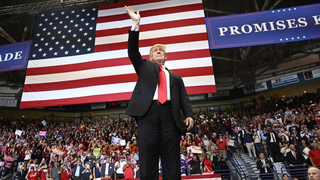 Donald Trump arrives to speak at a rally in Estero, Florida. Picture: AP.