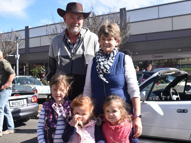 David and Liz Sparksman (back) with grandchildren Anabel, Gracie, and Millie Nightingale at the Jumpers and Jazz Grand Automobile Show on July 18, 2021.