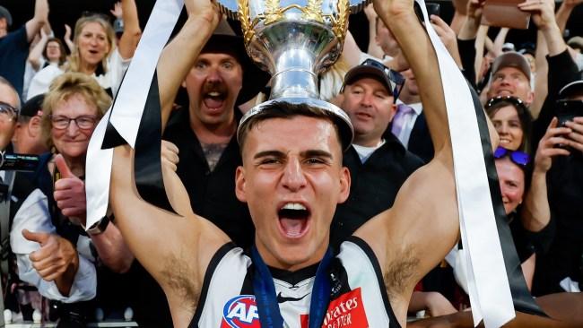 MELBOURNE, AUSTRALIA - SEPTEMBER 30: Nick Daicos of the Magpies celebrates with the premiership cup during the 2023 AFL Grand Final match between the Collingwood Magpies and the Brisbane Lions at the Melbourne Cricket Ground on September 30, 2023 in Melbourne, Australia. (Photo by Dylan Burns/AFL Photos via Getty Images)