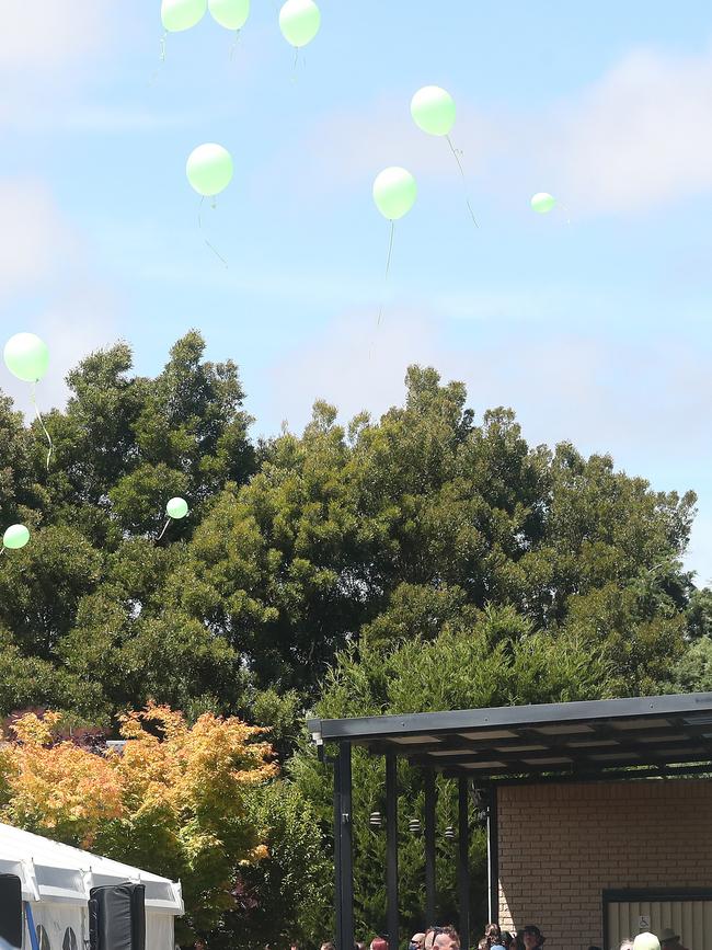 Attendees released bright green balloons in honour of the 12-year-old. Picture: Nikki Davis-Jones