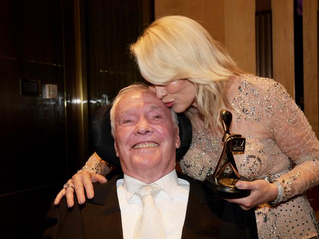 Kerri-Anne Kennerley and John Kennerley pose for photographs with her Gold Logie for the TV Week Logie Hall of Fame. Picture: AAP