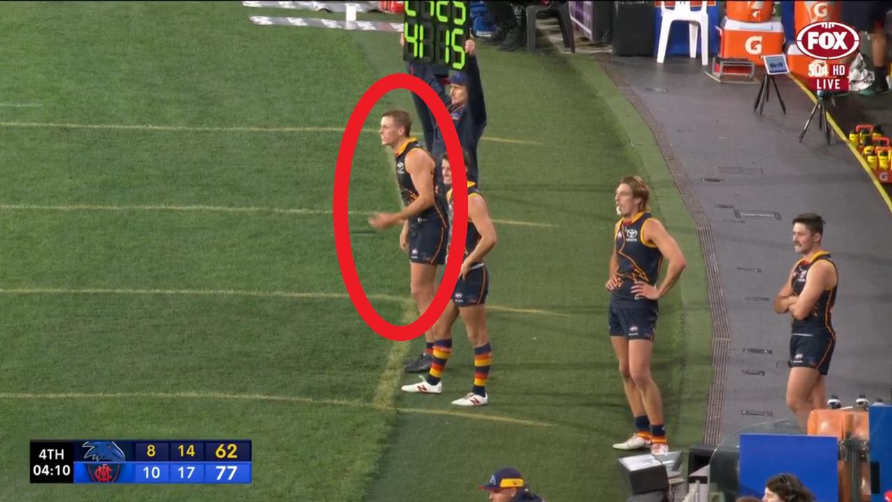 Jordan Dawson left stranded on the Crows bench. Credit: Fox Footy