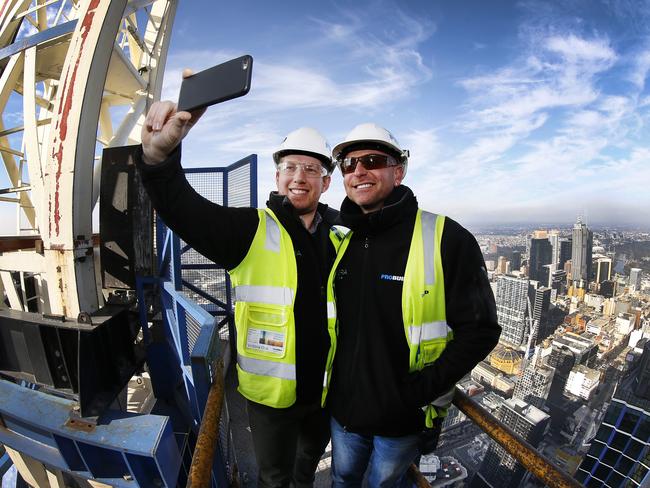 Taking the ultimate selfie, Probuild Project Manager Guy Chipperfield and Construction Supervisor Jason Graziano get a taste of the view close to the top of the building. Picture: David Caird