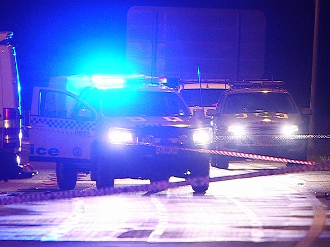 Police on the Pacific Hwy near Coffs Harbour where Lambert was shot dead. Picture: Frank Redward