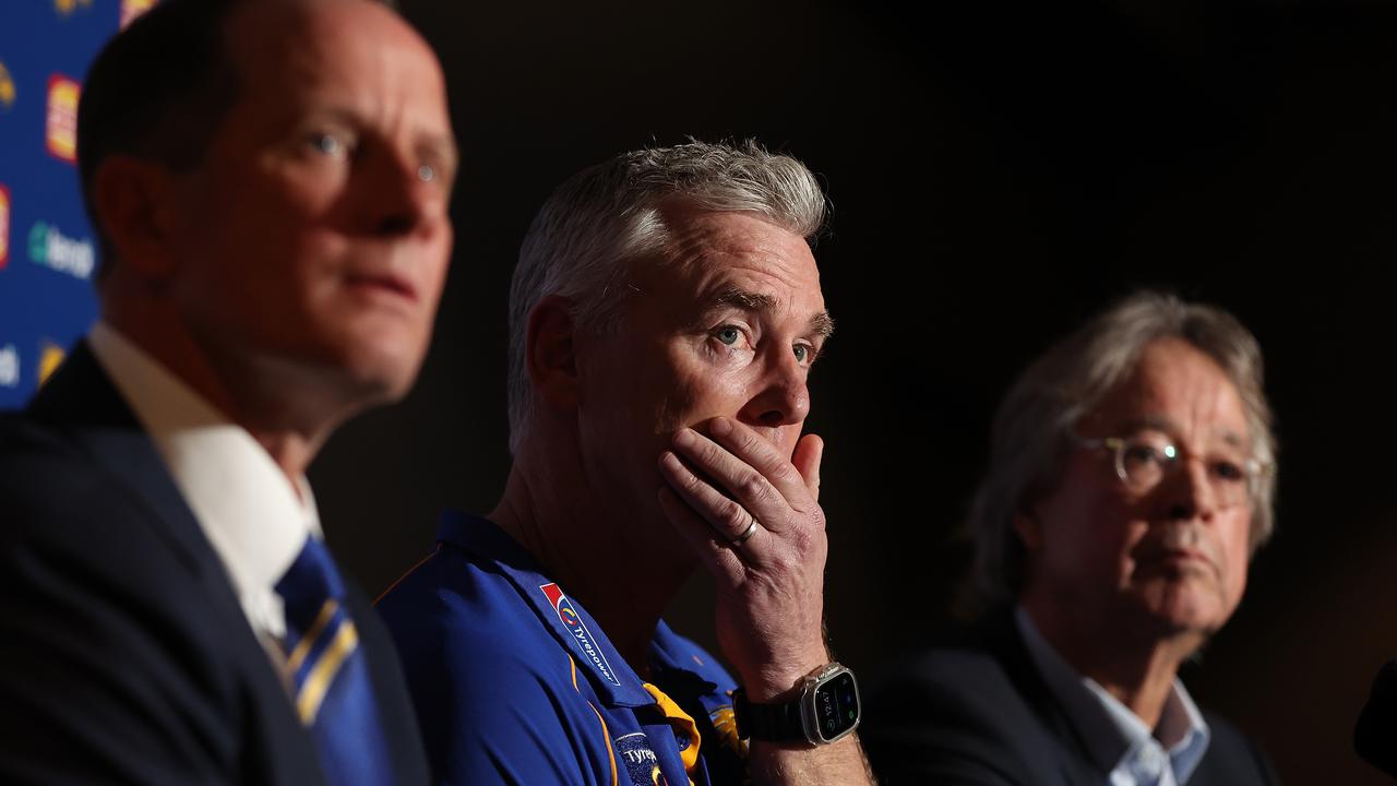 PERTH, AUSTRALIA - JULY 09: Adam Simpson looks on with Don Pyke (WCE CEO) and Paul Fitzpatrick (WCE Chair) after the West Coast Eagles and senior coach Adam Simpson mutually agreed that his 11-year tenure at the club will come to an end during a West Coast Eagles AFL press conference at Mineral Resources Park on July 09, 2024 in Perth, Australia. (Photo by Paul Kane/Getty Images)