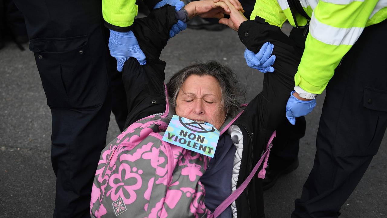 Extinction Rebellion Protester Glues Himself To British Airways Plane Au — Australia