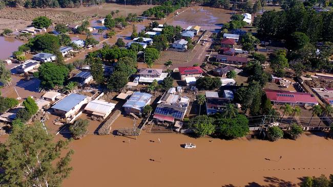 Properties in the suburb of Goodna in the far south-western outskirts of Brisbane are seen inundated by flood waters. Photo: Bradley Kanaris/Getty Images.