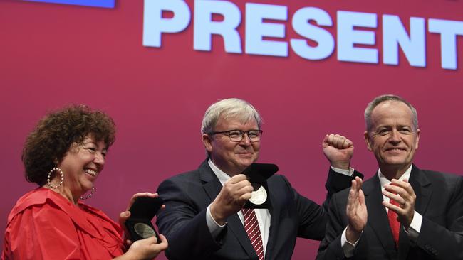 The perfect Labor Christmas present? Former Australian prime minister Kevin Rudd (centre) and his wife Therese Rein reunite with Bill Shorten. Picture: AAP