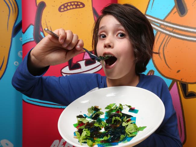 Noah, 9, eats some healthy rainbow pasta. Picture: Ian Currie