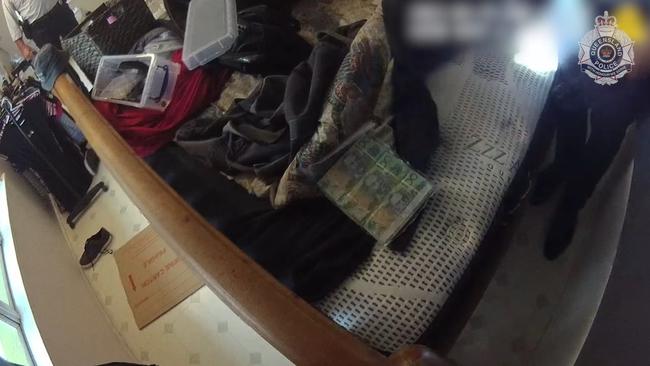 Detectives have charged six people following a raid for cash and drugs at a West Mackay home. Picture: Supplied