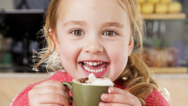 Ava Redman, 3, enjoys a free babycinos at Brother Nancy Cafe, Footscray. Picture: Nathan Dyer